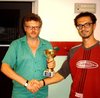 Il vincitore del torneo, premiato dal presidente del Circolo Scacchi Stratagemma di Corridonia.